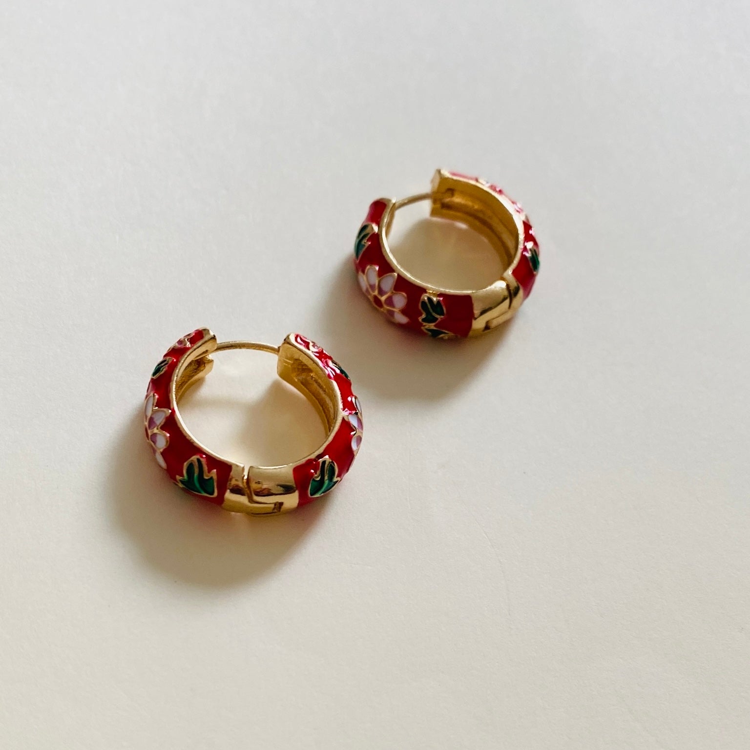 Red enamel hoop earrings